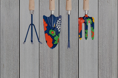 Marimekko brand gardening tools on a wooden floor